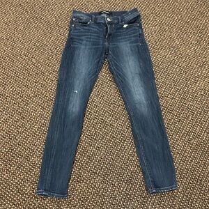 Blue Skinny Jeans with Distressed Details